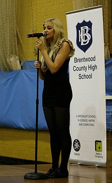 Pixie Lott performing at Brentwood County High School in 2010.