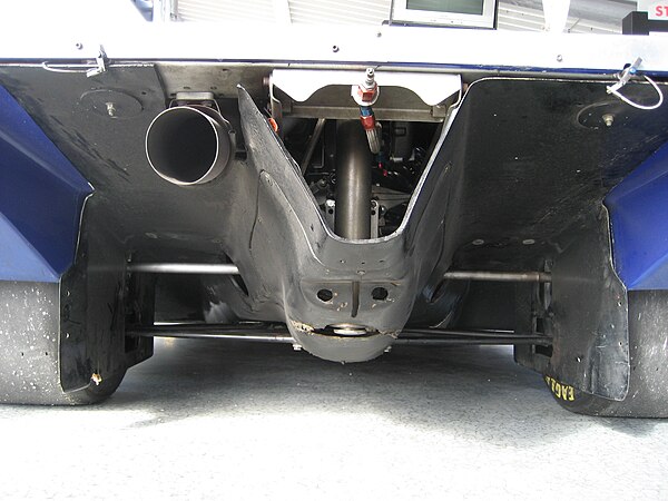 The rear diffuser of an IMSA-spec 962. The exhaust pipe and rear suspension are within the Venturi tunnels, while the gearbox and airjacks are in the 