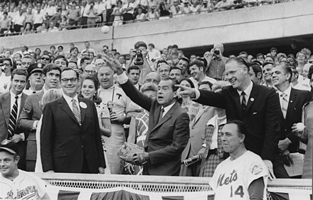 Richard Nixon throwing out the first ball of the game.