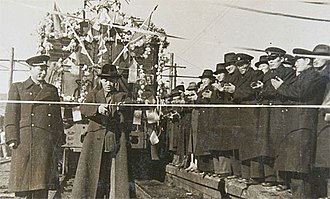 Ceremony commemorating the completion of the electrification of the Yangdok-Sinch'ang section of the P'yongwon Line in 1948. Pyongwon Line electrification 1948.jpg