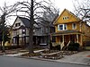 Large frontal gables, asymmetrical façades, and conical turrets (center) are all characteristics of the Queen Anne style of architecture, which can be found all over the Elmwood Village's housing stock. These houses are located on Ashland Avenue between Hodge Avenue and West Utica Street.