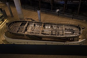 The longboat from Vasa. Whilst differing from many longboat designs (this example is double ended, when other longboats had a transom stern) the picture shows the windlass amidships for raising an anchor. Regalskeppet Vasa lettbat (2).jpg