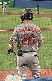 Baltimore Orioles right fielder Ryan McKenna (26) stands near the