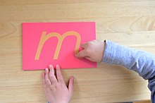 Educational materials like sandpaper letters are designed to appeal to young children's senses. Sandpaper letters.jpg