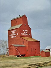 Alberta Wheat Pool elevator Ltd. wooden cribbed elevator at the Scandia Eastern Irrigation District Museum in Scandia, Alberta Scandia 002a.jpg