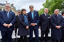 Secretary Kerry and Mayor Anne Hidalgo of Paris, 2015 Secretary Kerry Chats With Paris Mayor Hidalgo After 70th Anniversary VE Day Commemoration at Arc d'Triomphe (16801922774).jpg