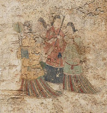 Women's dress under Goguryeo influence, with overlapping collar and mo skirt.[5] (Takamatsuzuka Tomb, 7th century)
