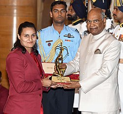 The President, Shri Ram Nath Kovind presenting the Arjuna Award, 2018 to Ms. Pooja Kadian for Wushu, in a glittering ceremony, at Rashtrapati Bhavan, in New Delhi on September 25, 2018.JPG