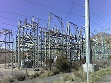 A transmission substation decreases the voltage of incoming electricity, allowing it to connect from long-distance high-voltage transmission, to local lower voltage distribution. It also reroutes power to other transmission lines that serve local markets. This is the PacifiCorp Hale Substation, Orem, Utah, US. Transmissionsubstation.jpg