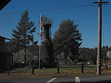 Preserved steam donkey next to the fire station