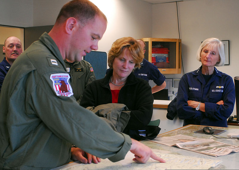 File:U.S. Coast Guard Lt. Christopher Stoeckler, left, an MH-60 Black Hawk helicopter pilot with Air Station Kodiak, Alaska, explains the plane crash that killed former Alaska senator Ted Stevens to Coast Guard Vice 100903-G-IA651-001.jpg