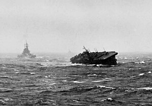 USS Langley (CVL-27) rolling heavily during Typhoon Cobra, 18 December 1944.