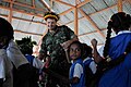 US Navy 090828-N-9689V-003 Lt. Darrin Davis dances with students during a Pacific Partnership 2009 community service project at Bikenbeu West Primary School.jpg .jpg