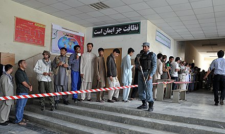 Voters queuing up in front of a polling center in Kabul during the 2014 presidential election. Voters in Kabul during the 2014 presidential election.jpg