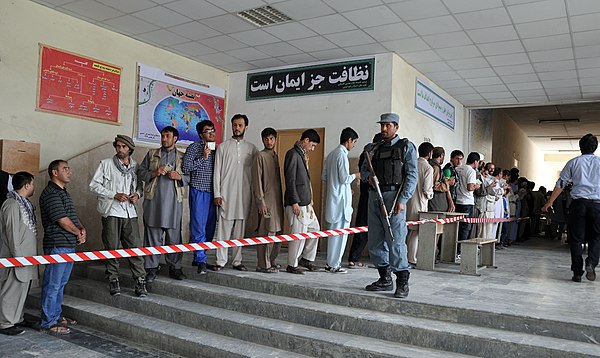 Voters queuing up in front of a polling center in Kabul during the 2014 presidential election.