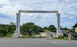 Gapura selamat datang di Desa Serdang