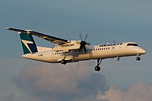 Bombardier Dash-8 Q400, (C-FQWE) de WestJet Encore à l'approche de l'aéroport de Toronto