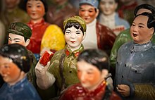 Porcelain statue of a woman in communist China - Cat Street Market, Hong Kong Woman in Communist China.jpg
