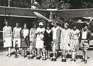 From left to right: Louise Thaden, Bobbi Trout, Patty Willis, Marvel Crosson, Blanche Noyes, Vera Dawn Walker, Amelia Earhart, Marjorie Crawford, Ruth Elder, Pancho Barnes; NC229K, de Havilland DH.60 Moth (c/n 41); at the Breakfast Club, Los Angeles, California; Before the start of the First National Women's Air Derby 1929 Women's National Air Derby.jpg