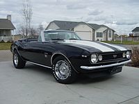 1967 Chevrolet Camaro SS convertible (with inappropriate user-added Z/28 stripes, non-standard white letter tires)