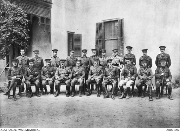 Group portrait of 1st Division staff officers at Mena Camp, December 1914. White, then a lieutenant colonel, is in the front row, fourth from the left