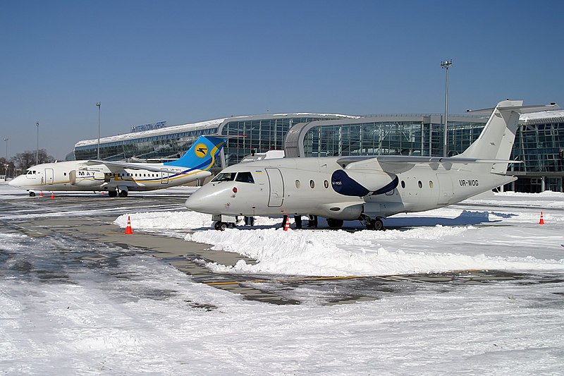 File:Aerostar Dornier 328JET and Ukraine International Airlines Antonov An-148 at Lviv Airport.jpeg