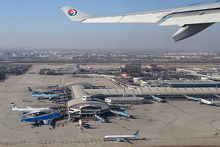Takeoff view of Beijing Capital's Terminal 2, captured from China Eastern Airlines Airbus A330.