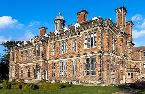 The south-west facade of Sudbury Hall, a country house in Derbyshire, UK