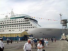 MV Aurora moored adjacent to the Gibraltar Cruise Terminal on the Western Arm of the North Mole in Gibraltar Harbour. Aurora gib.jpg