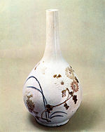 Blue-and-white Porcelain Bottle with Underglaze Iron and Copper Grass and Insects Design.jpg