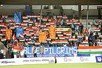 Blue Pilgrims displaying national flag and their own banners at the 2018 Intercontinental Cup Blue Pilgrims at Mumbai 2018 to support India national football team.jpg