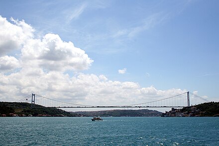 Looking south below the FSM Bridge, towards the city centre — Europe is on the right, and Asia on the left (due to the bend of the Bosphorus, more of the Asian landmass can also be seen ahead)