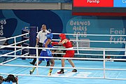 Deutsch: Boxen bei den Olympischen Jugendspielen 2018 Tag 12, 18. Oktober 2018 - Finale Leichtgewicht Mädchen – Junioren-Weltmeisterin und dreifache Juniorinnen-Europameisterin Caroline Sara DuBois (Großbritannien, blau) schlägt Juniorinnen-Asienmeisterin Porntip Buapa (Thailand, rot). English: Boxing at the 2018 Summer Youth Olympics on 18 October 2018 – Girls' lightweight Gold Medal Bout – Caroline Sara DuBois (Grat Britain, blue) wins over Porntip Buapa (Thailand, red). Español: Boxeo en los Juegos Olímpicos Juveniles de Verano de 2018 en 18 de octubre de 2018 - Combate de medalla de oro de peso ligero para niñas - Caroline Sara DuBois (Gran Bretaña, azul ) gana sobre Porntip Buapa (Tailandia, rojo).