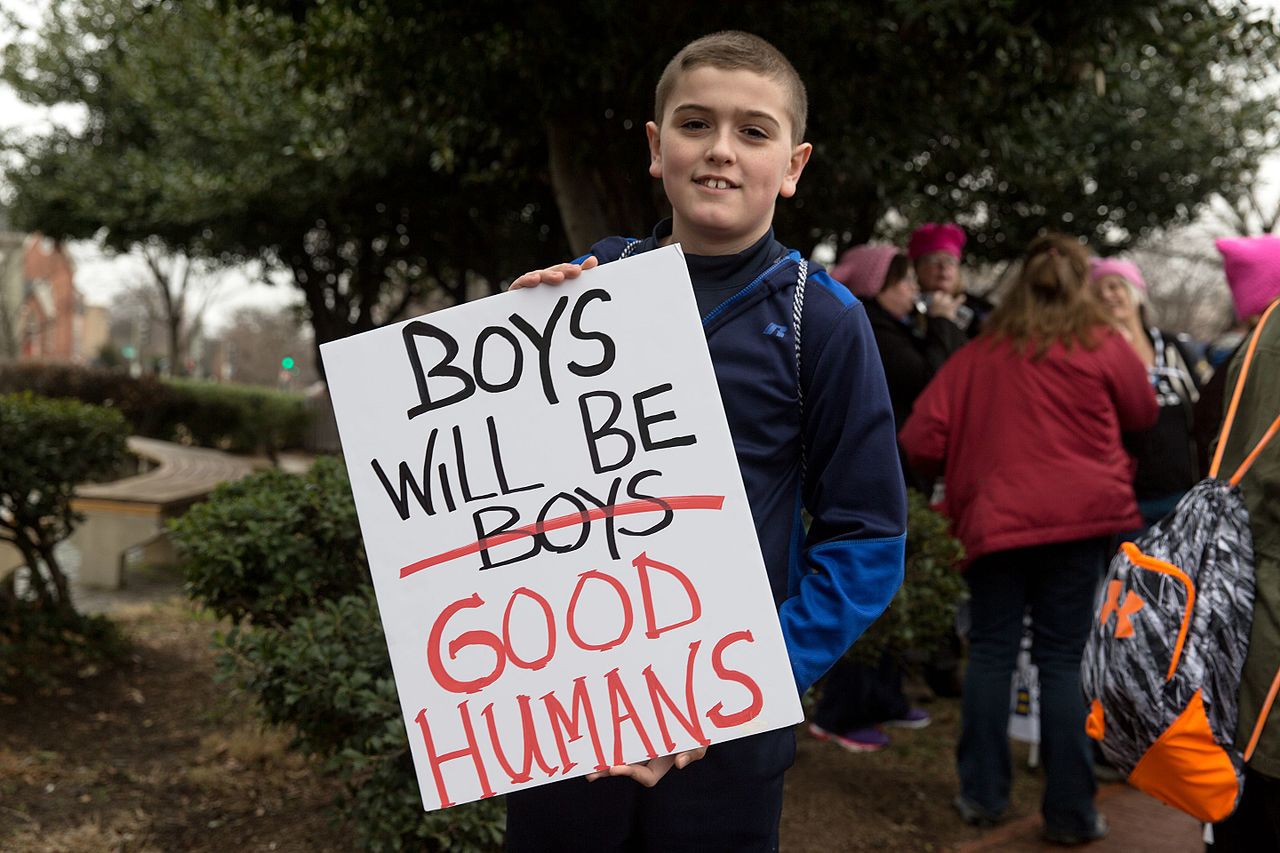 https://upload.wikimedia.org/wikipedia/commons/thumb/5/56/Boys_Will_Be_Good_Humans...and_you%2C_my_friend%2C_are_a_good_human._Thank_you_for_marching%21_%2832411084386%29.jpg/1280px-Boys_Will_Be_Good_Humans...and_you%2C_my_friend%2C_are_a_good_human._Thank_you_for_marching%21_%2832411084386%29.jpg