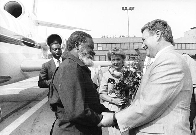 Günter Sieber (right), member of the SED Central Committee and head of the International Relations Department, greets Sam Nujoma on arrival in Berlin,