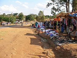 Chipata - roadside clothes vendors.JPG