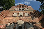 English: Lutheran church in Dźwierzuty and cemetery nearby. Polski: Kościół ewangelicki we wsi Dźwierzuty oraz pobliski cmetarz.