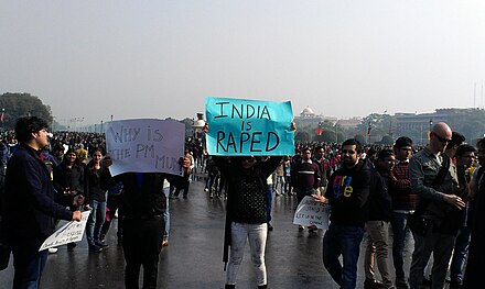 People in Delhi, India protesting after a young student was gang-raped in Delhi in December 2012.