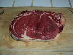 An uncooked sirloin steak