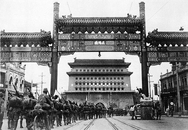 Japanese troops march into Zhengyangmen of Beijing after capturing the city in July 1937