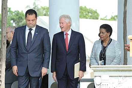 NAACP President and CEO Benjamin Jealous and former president Bill Clinton during the Medgar Evers wreath-laying ceremony in Arlington, June 5, 2013
