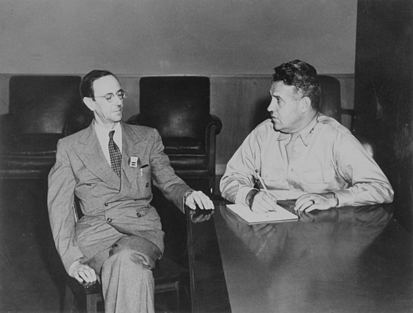 James Chadwick (left), head of the British Mission, with Major General Leslie R. Groves Jr., director of the Manhattan Project