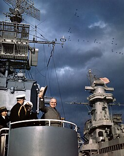 President Harry S. Truman (waving his hat) with his party on board USS Renshaw during the Navy Day Fleet Review in New York Harbor, 27 October 1945. Harry S. Truman aboard USS Renshaw (DD-499) during the Navy Day Fleet Review in New York Harbor, 27 October 1945 (80-G-K-15861).jpg