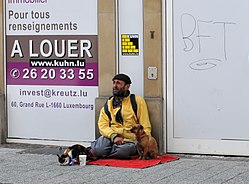 Beggar in Luxembourg City, in the Grande Rue Heeschemann an der Groussgaass.jpg