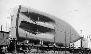 Hull of the Radium Express being shipped to Waterways alberta, 1939.jpg