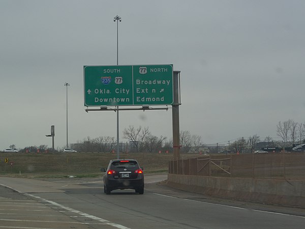 The northern end of I-235 at its interchange with I-44; the freeway, however, continues north into Edmond, Oklahoma, as US-77, also known as the Broad