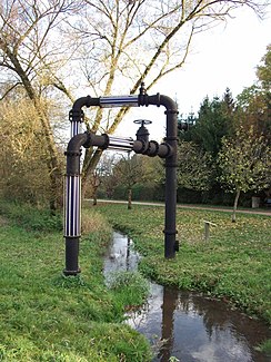 The Mainbach near Rednitzhembach with the work of art Lichtvier (2012)