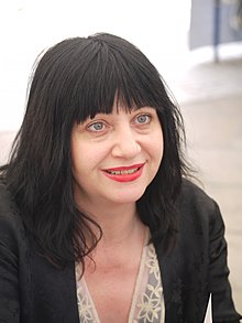 No wave artist Lydia Lunch was one of the producers on Why Love Now. Lydia Lunch - Comedie du Livre 2010 - P1390454.jpg