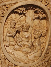 Maya Devi with her son Siddhartha Roundel 6 buddha ivory tusk.jpg