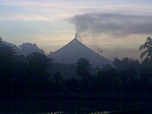 Mayon with ash explosion at dawn on December 18, 2009